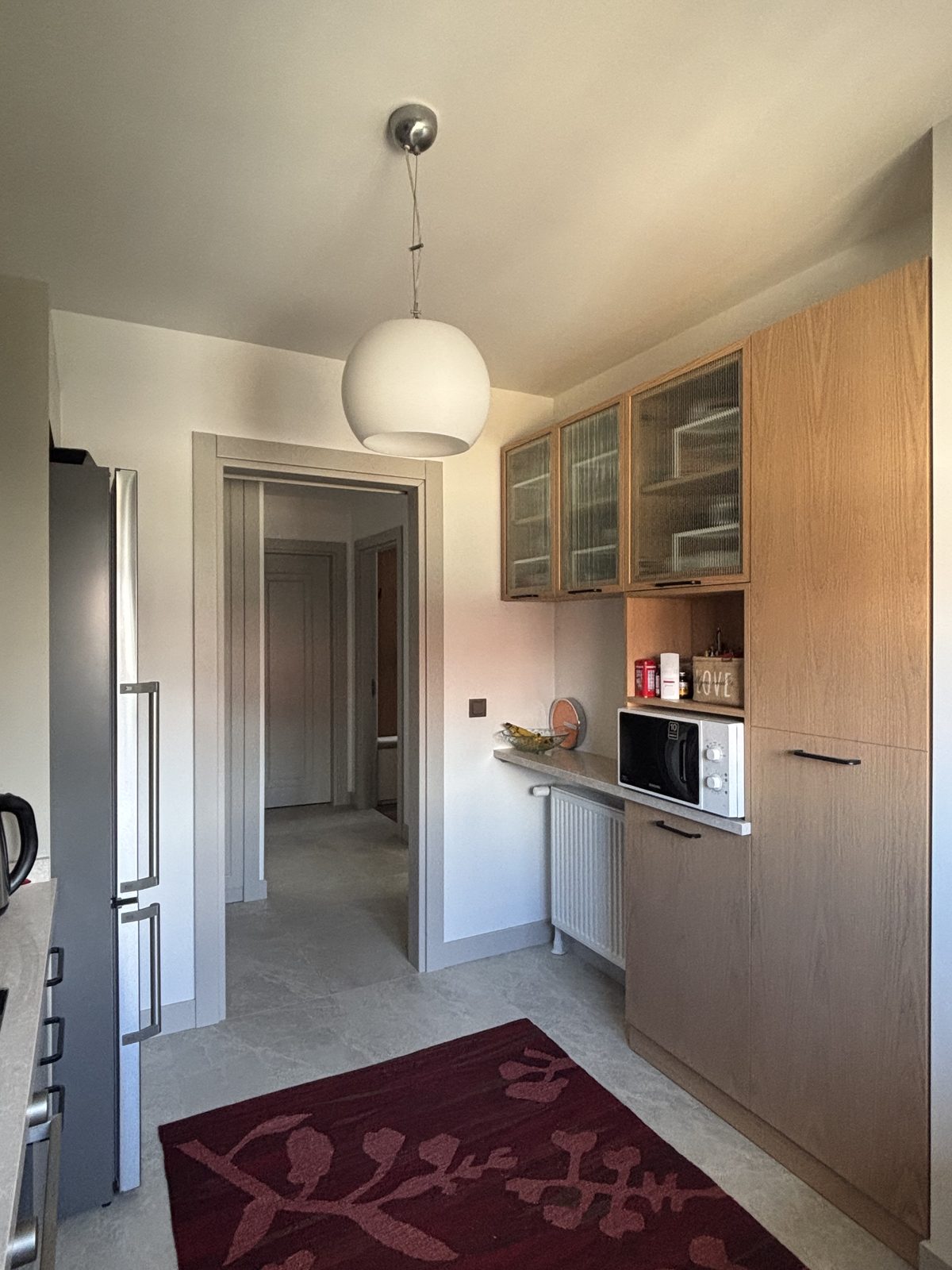 Open shelving unit beside the sitting area