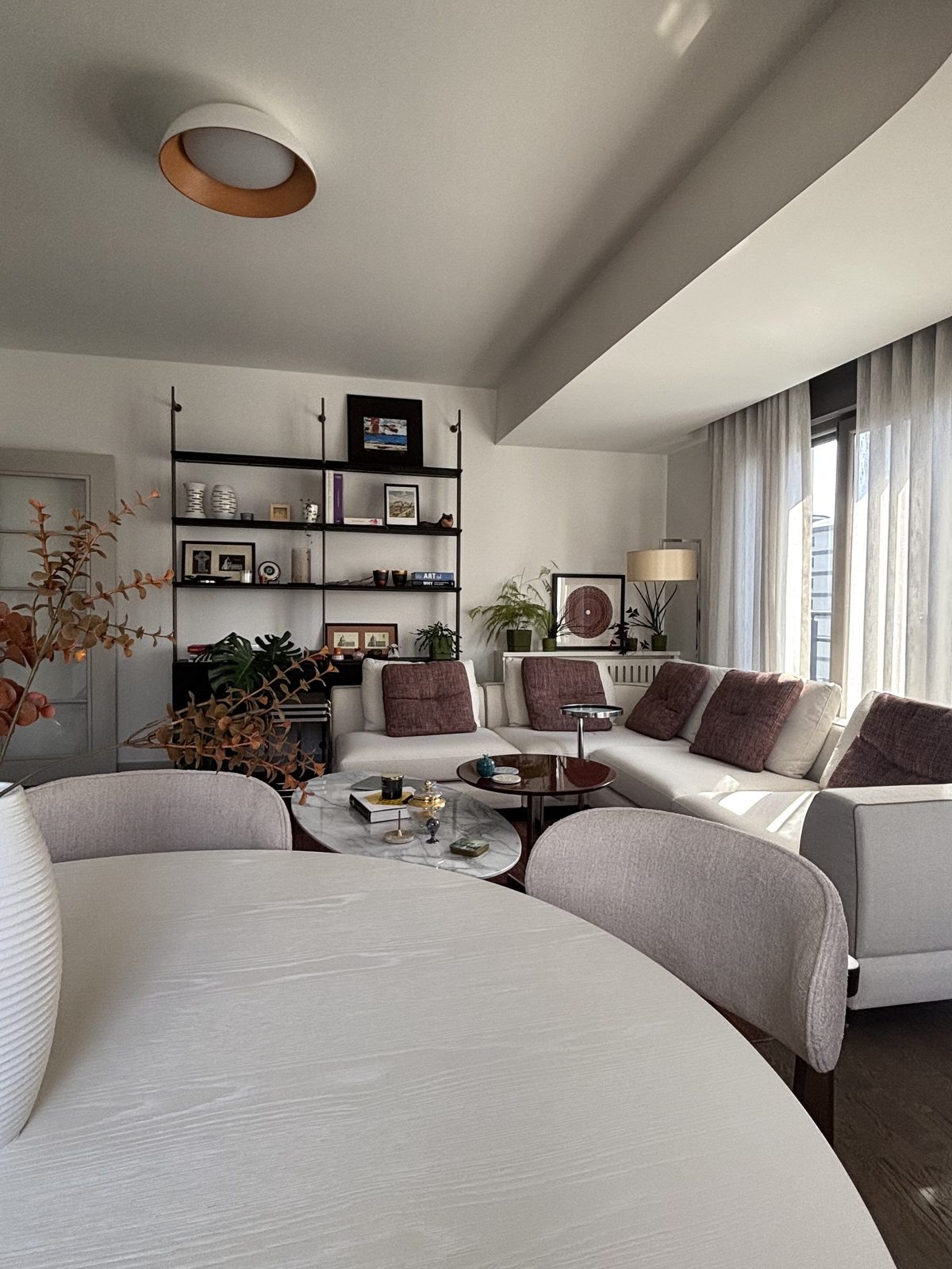 Custom corner shelving between rooms